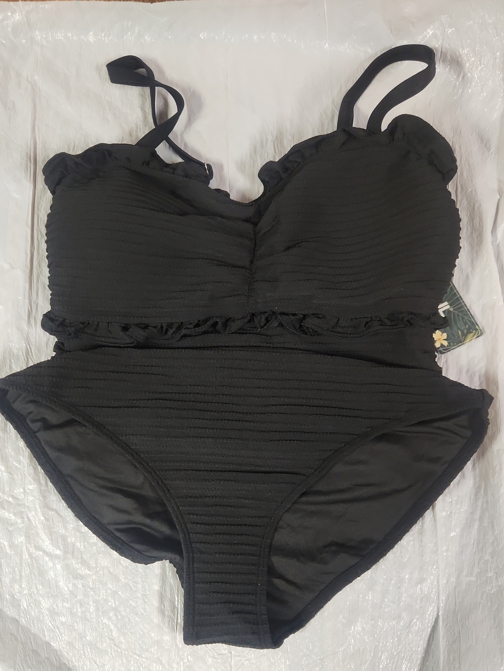 Black one piece swimming suit.
